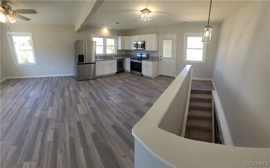 Kitchen with appliances with stainless steel finis
