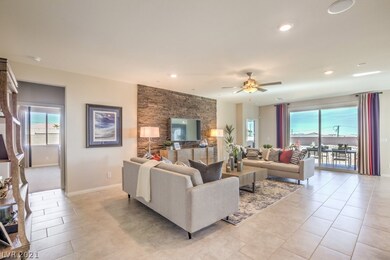 Great room. Ceiling fan included. Pictures are of
