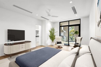 Walk into a contemporary and airy primary bedroom