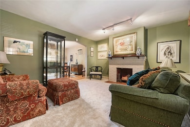 New, neutral wall to wall carpeting in living room