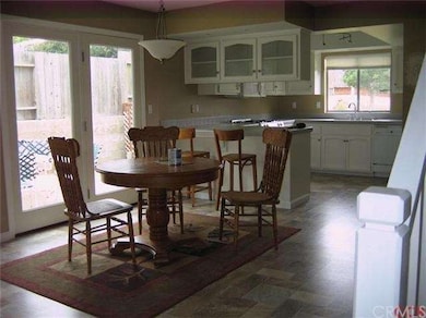 Newer, easy-care laminate floor for casual dining 