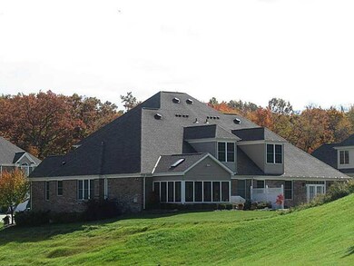 Exterior Back. Flat backyard with greenspace behin