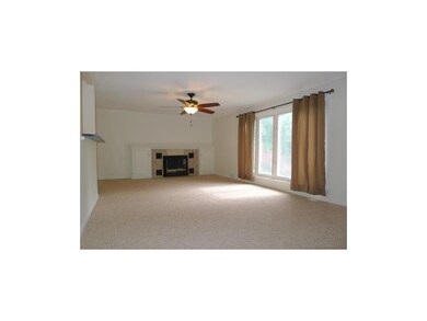 LIVING ROOM WITH GAS START FIREPLACE AND BLOWERS. 