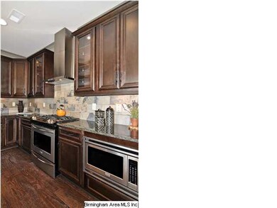 View of the stainless range and stainless vented h