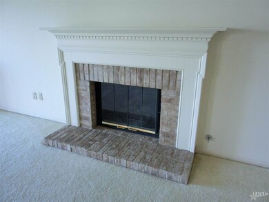 The great room gas log fireplace