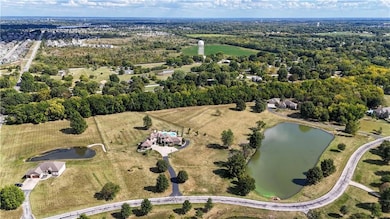 15515 Meadowbrook Ct, Raymore, MO 64083 - photo 2