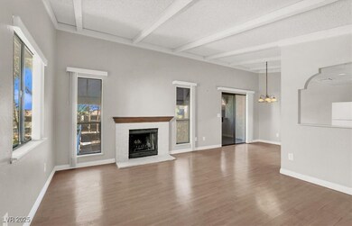 Unfurnished living room with baseboards, a firepla