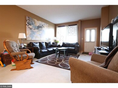 Main level living room with walk out to front pati