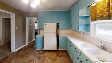 Love this spacious and colorful kitchen!! Window o