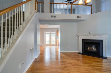 Open floor plan with beautiful hardwood floors on the main level.