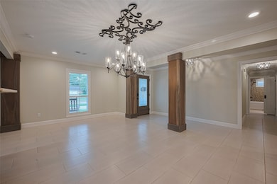 The stunning dining room chandelier exudes luxury.