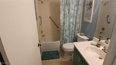 Master Bathroom Full bathroom with tile patterned