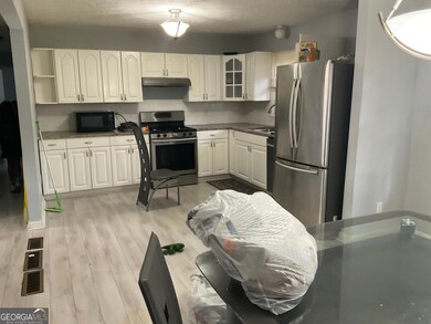 6485 Bobolink Ct, Rex, GA 30273 - photo 4