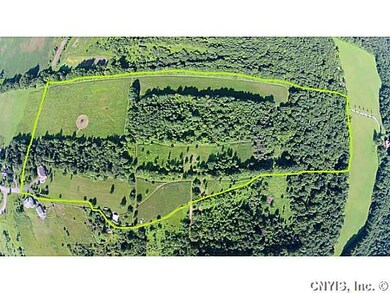 Aerial View. On 26.77 acres with road frontage on 