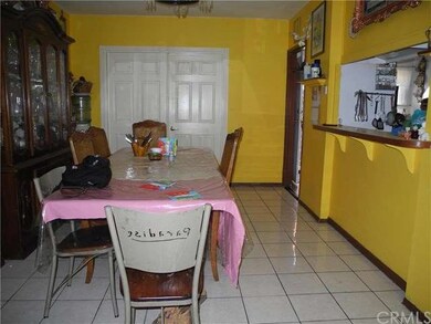 Large dining room. Doors are to the enclosed patio