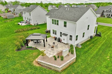 EXCITING NEW STAMPED-CONCRETE PATIO WITH GARDEN WA