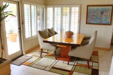 Dining area opens onto the large waterfront patio.