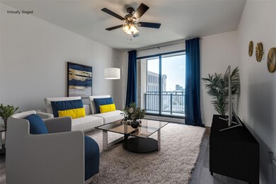 Living room with ceiling fan and hardwood / wood-s