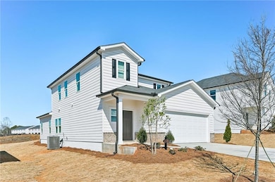 Traditional home featuring driveway and cooling un