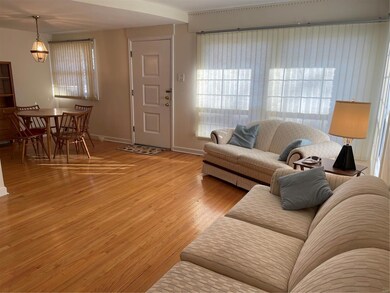 Living room and adjoining dining room.