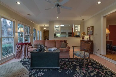 Fabulous added sunroom off of den is also open to 