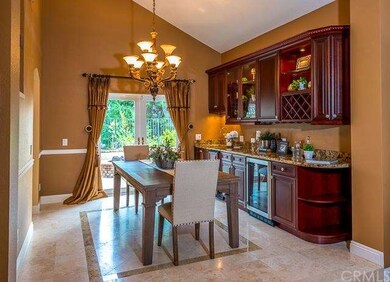 Gorgeous custom butler bar with dual zoned wine re