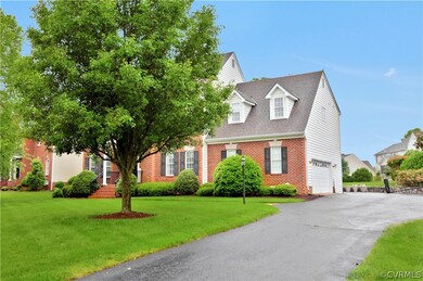 Front view of home showing side entrance garage.