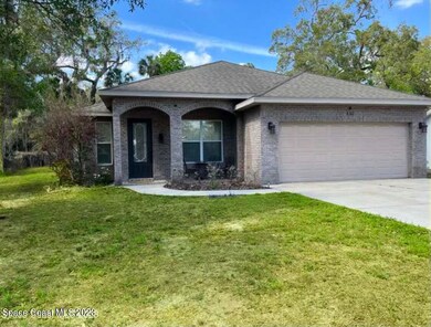 410 Indian Oaks Ct, Titusville, FL 32796 - photo 2