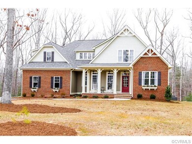 Exterior Front w/ Front Porch. On 1.5 Acres.