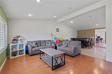Spacious living room with high ceilings and recessed lighting!
