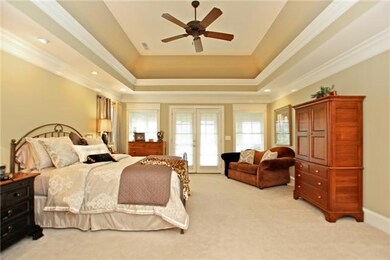 Master suite with sunroom over looking golf course  