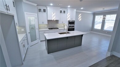 Very large island with sink in the center of all t