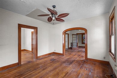 The floor is covered with hardwood, displaying a r