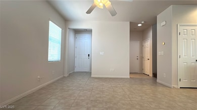 Spare room with ceiling fan and plenty of natural