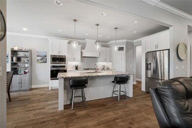 Open kitchen with stainless appliances *Refrigerat
