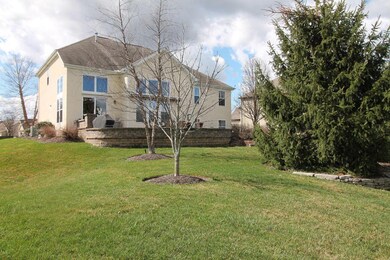 Back view of home and patio