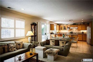 Family room opens to kitchen providing light and e