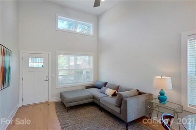 Tall lofty ceiling with warm natural light.jpg