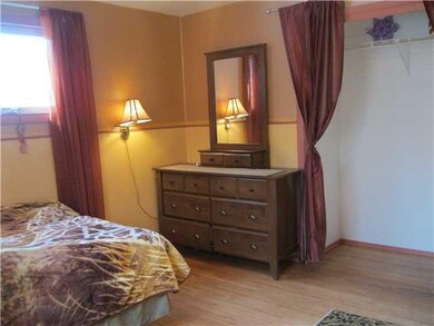 Bathroom upstairs bedroom with hardwood & new wind