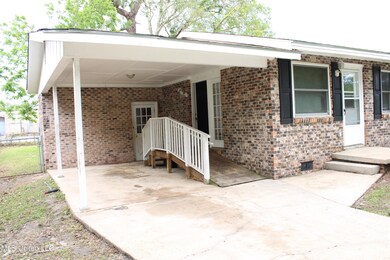 Carport and wheel chair ramp