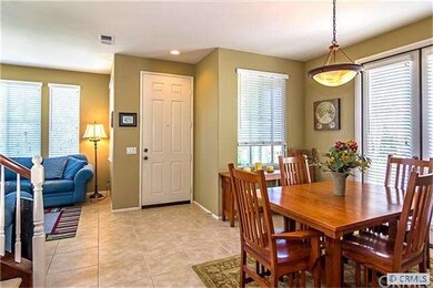 Bright entry way with Formal Dining Room and Livin