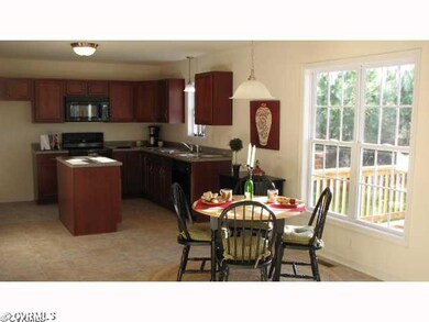 Kitchen - photo is of model and may show optional 