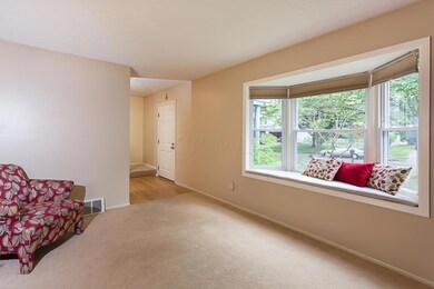 LIVING ROOM WITH BAY WINDOW