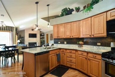Kitchen is open to expansive great room.