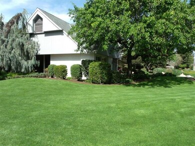 View of south side of house with sweeping front la