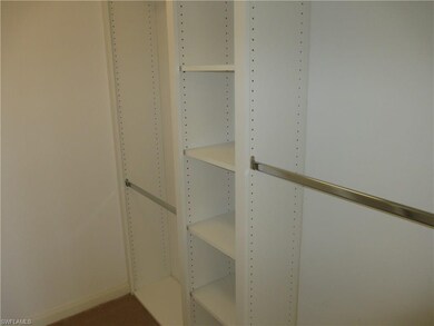 Walk in closets have adjustable shelves and clothe