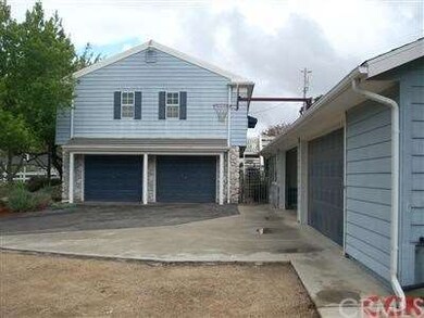 Two car attached garage and four car detached gara