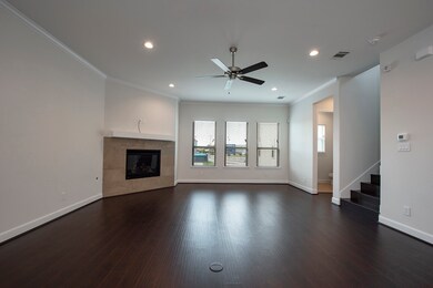 Features fireplace, laminate flooring, electrical plugs in flooring, Low E Windows