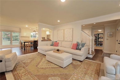 Living Room opens to Kitchen