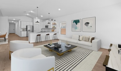 Airy vaulted ceiling unites main living areas
